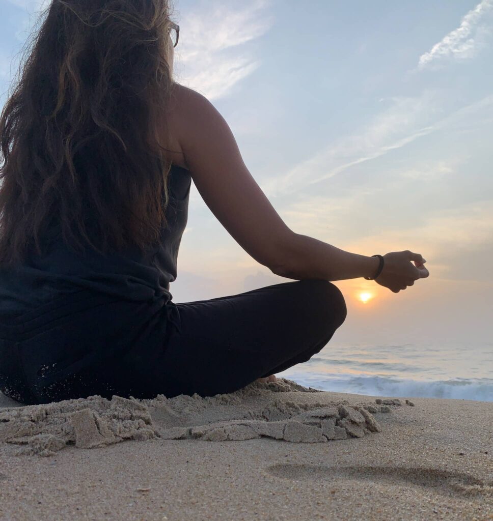 meditating at sunrise - 15 tips for better sleep

